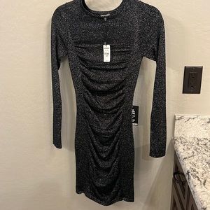 Never worn express dress. Black with silver sparkles